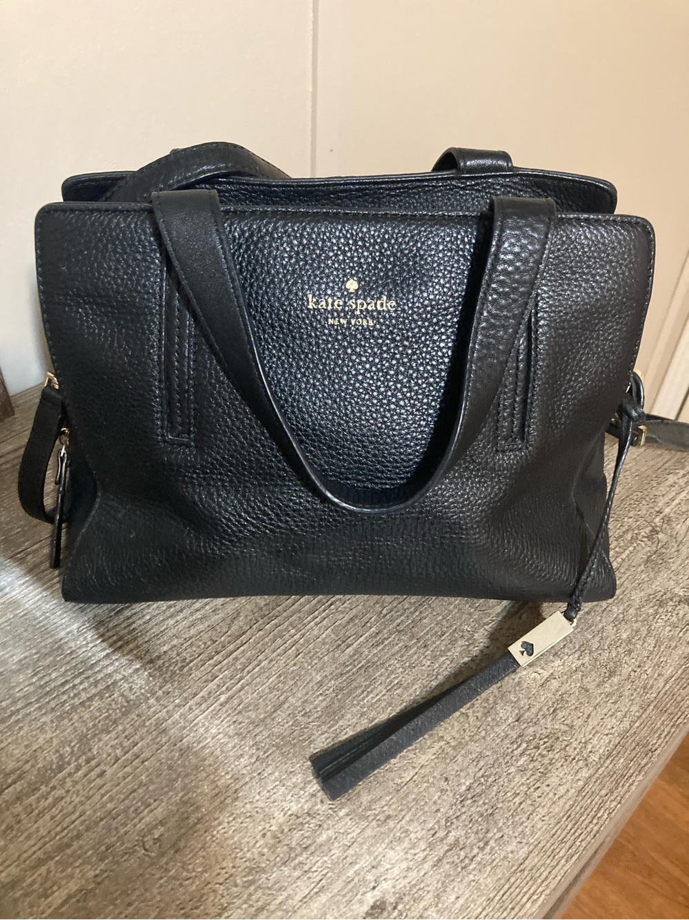 kate spade Black Pebbled Leather Tote with Tassel Charm